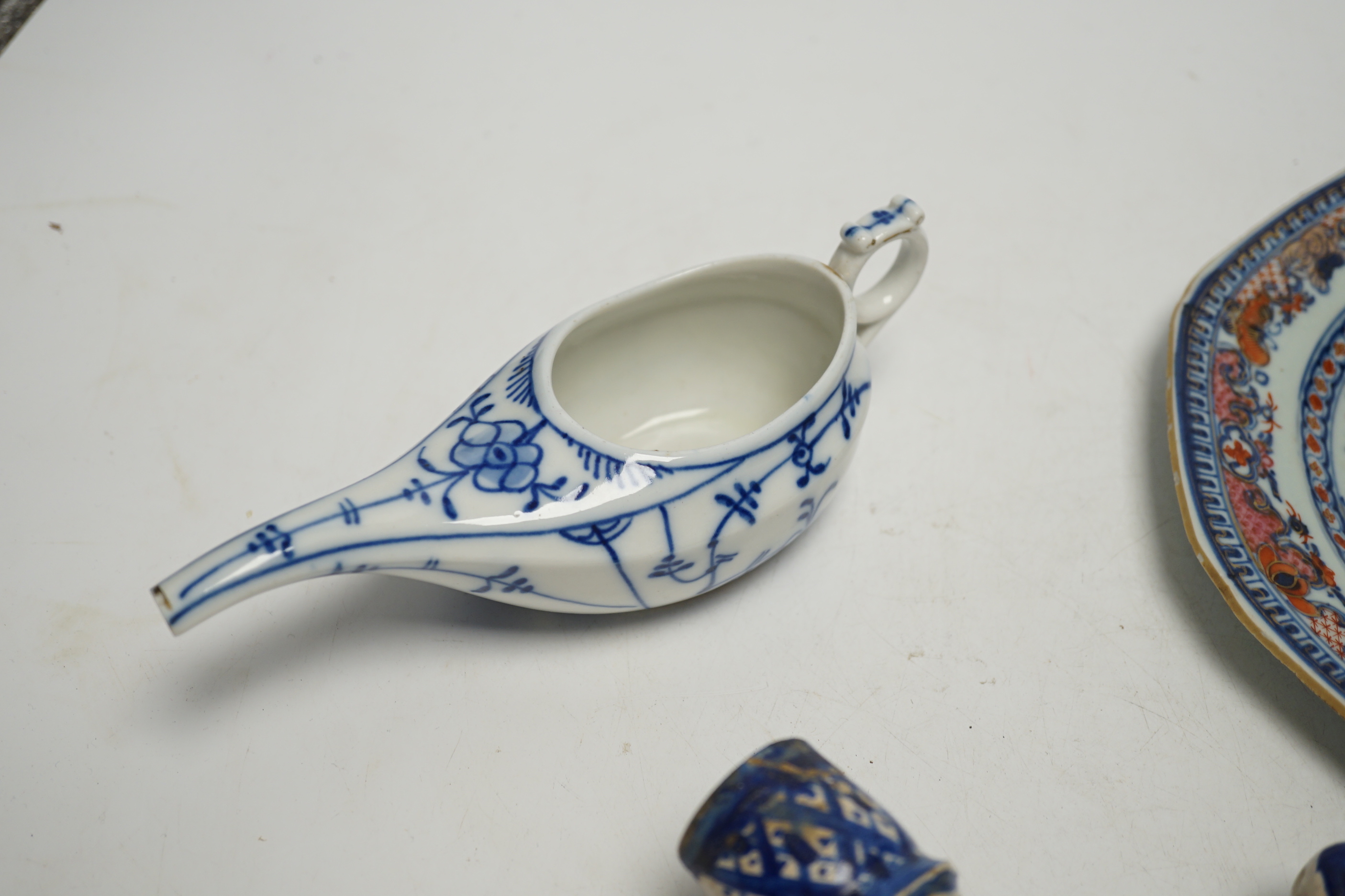 An 18th century Chinese export dish, a Iznik style flask and an onion pattern piece